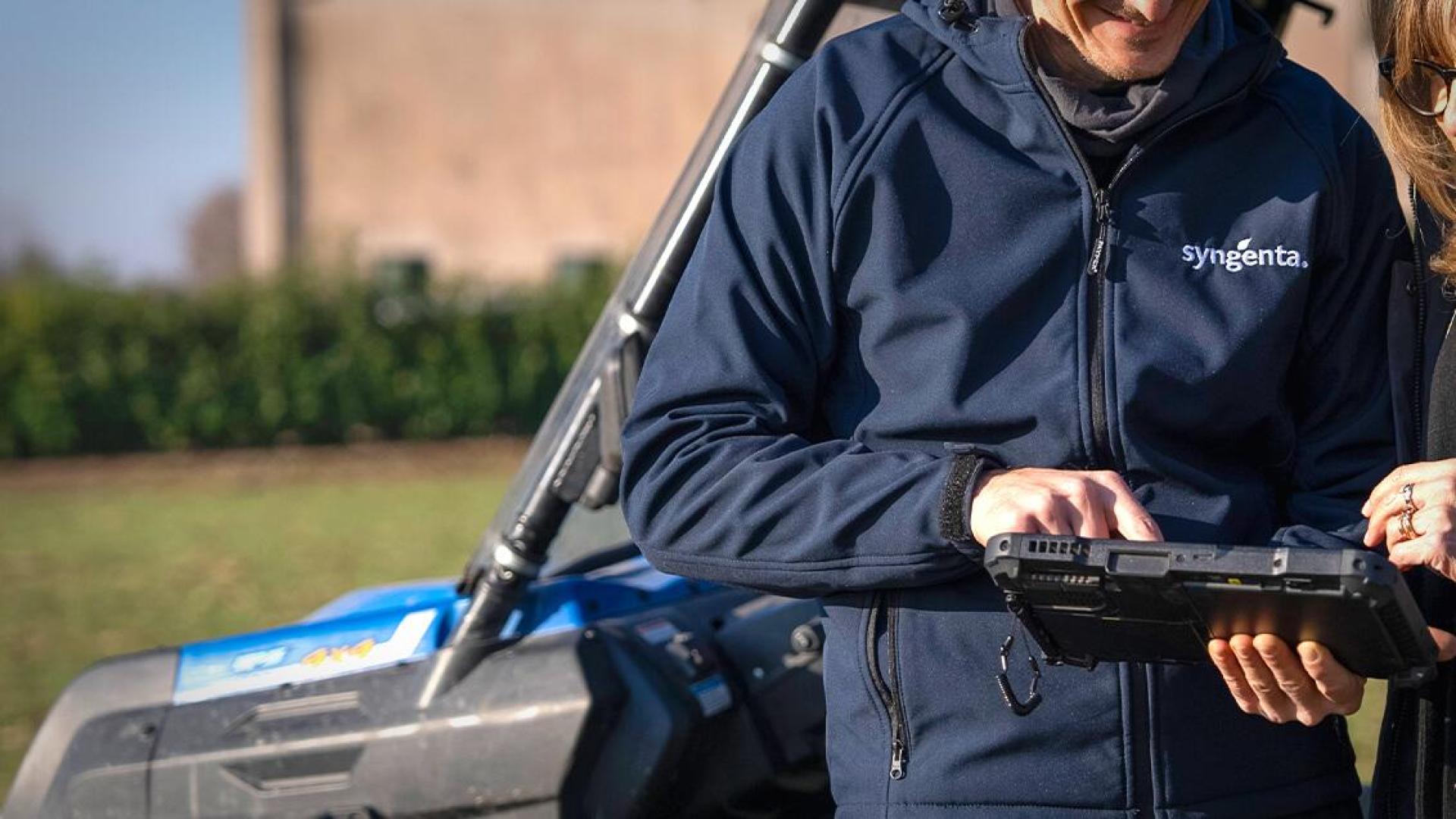 Syngenta employee with a tablet 